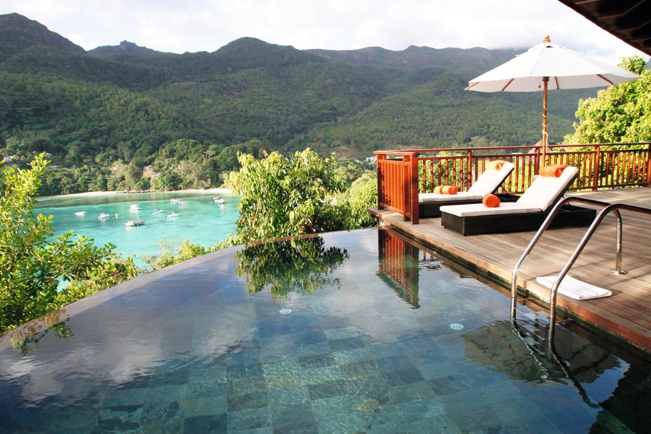 Hotel Constance Ephelia Port Glaud Esterno foto A pool at the resort